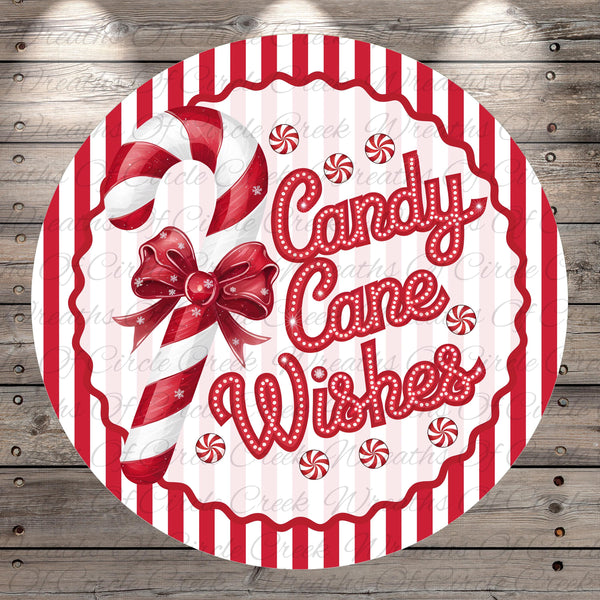 A round, red and white sign with the text "Candy Cane Wishes" and a candy cane decoration.