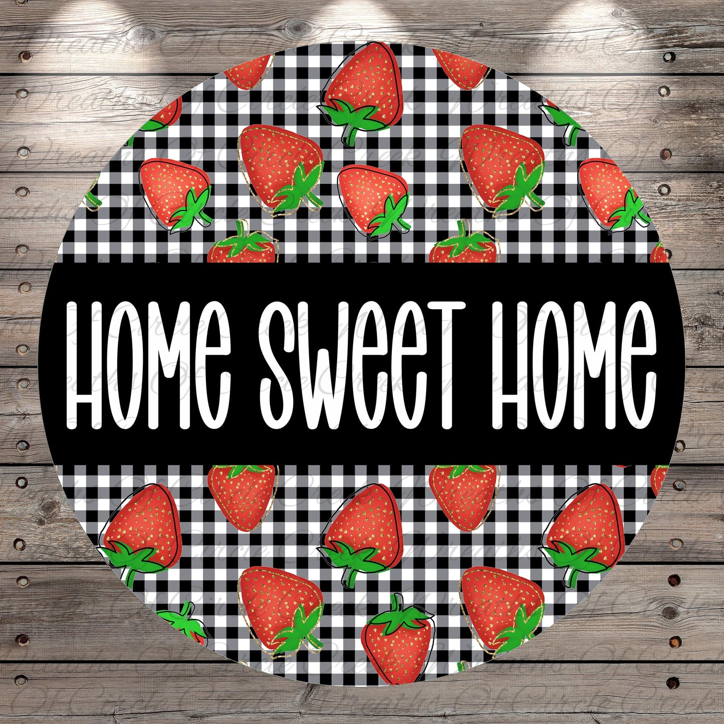 a circular design with a black and white checkered pattern and a repeating pattern of red strawberries. The text "HOME SWEET HOME" is written in white letters in the center of the design.