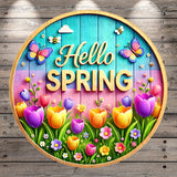 A colorful circular sign with the text "Hello Spring" surrounded by a variety of flowers, butterflies, and bees.