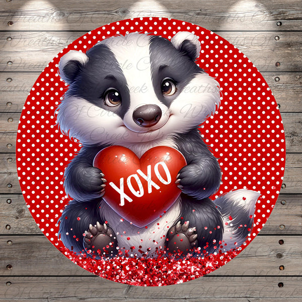 A cute cartoon badger holding a red heart with the word "XOXO" written on it, surrounded by red polka dots on a red background.