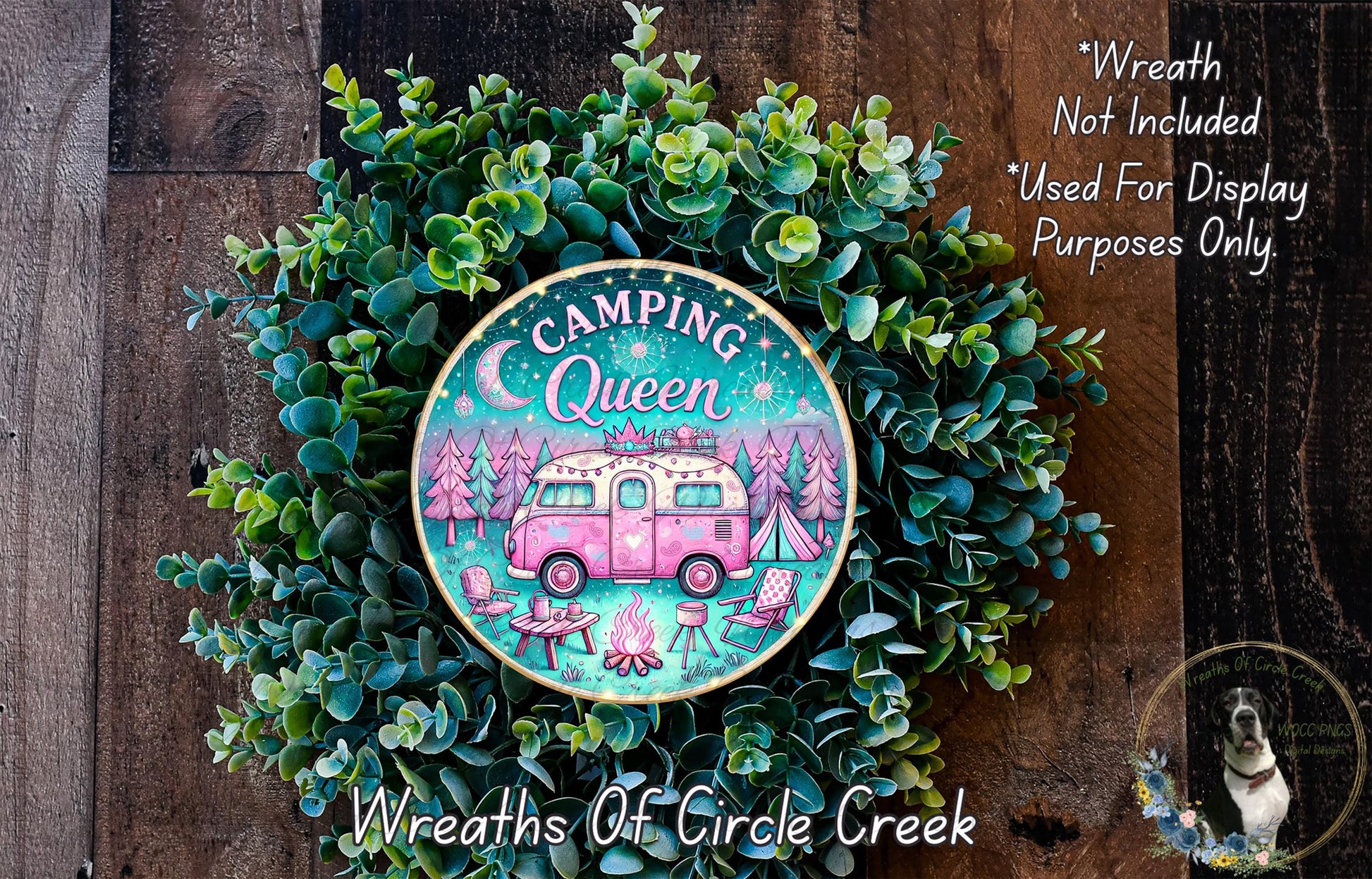 a wreath with a pink camper painted on it