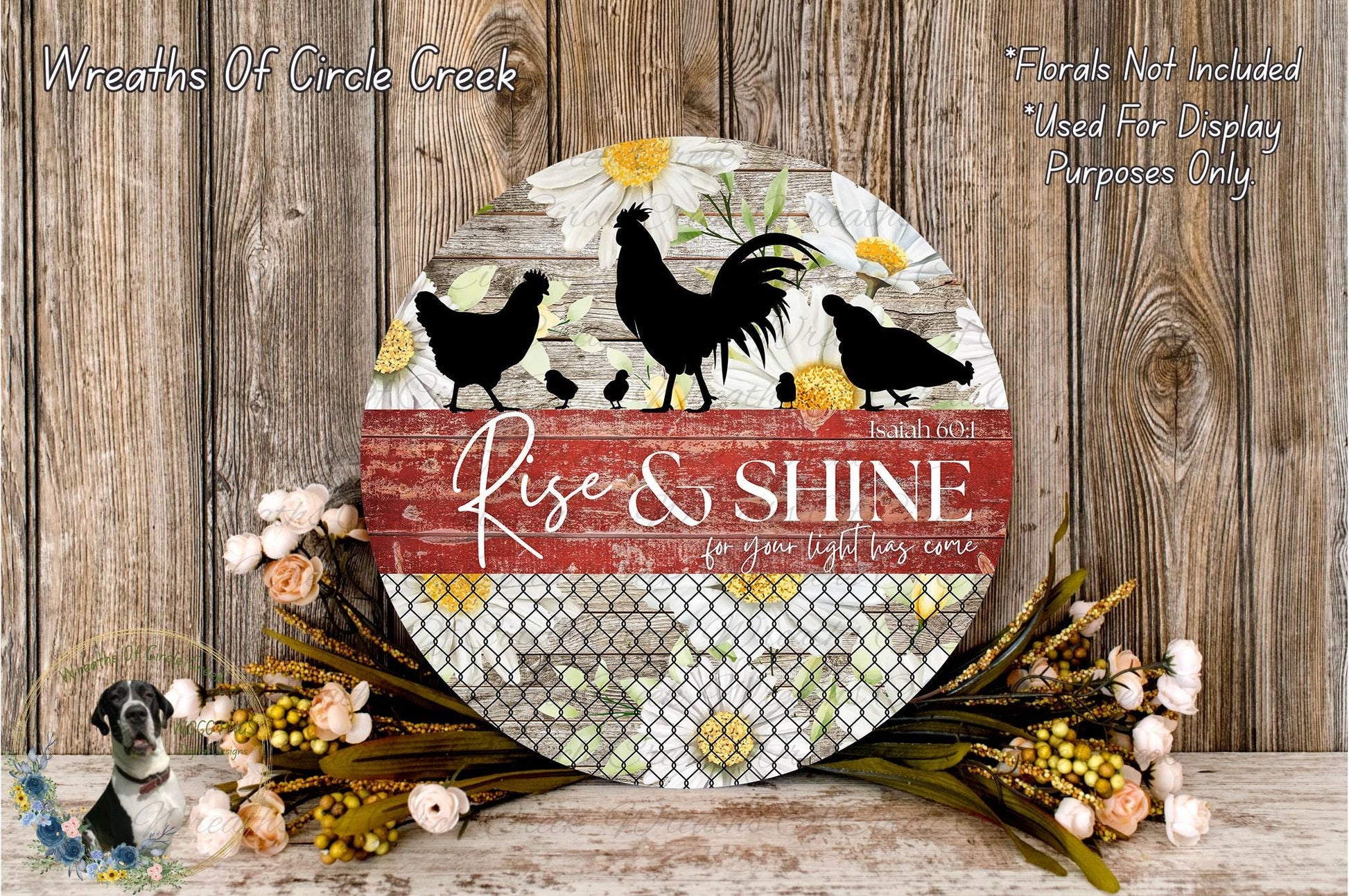 a decorative sign with a floral design and the text "Rise & Shine" on it, placed on a wooden surface. The sign is surrounded by flowers and a wire mesh, creating a rustic and charming atmosphere.