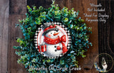 A wreath made of green foliage and featuring a snowman decoration, with a text overlay that reads "Wreath Not Included * Used For Display Purposes Only" and "Wreaths of Circle Creek".