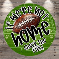 a football on a green football field with the text "If we're not home, check the field" written around it.