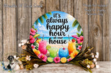 a round sign with a tropical beach theme, surrounded by colorful flowers and tropical drinks. The sign reads "It's always happy hour at our house" and is displayed on a wooden surface.