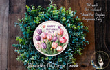 A wreath made of green leaves and pink and purple tulips, with a circular sign that reads "Happy Mother's Day".