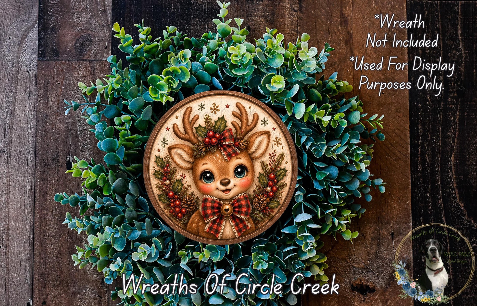 A wreath featuring a deer head with antlers and a bow, surrounded by green foliage.