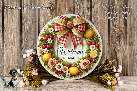 a welcome sign with a wreath of fruit and flowers