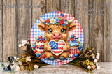 A decorative wreath featuring a cow wearing a patriotic hat and holding a heart-shaped American flag. The wreath is surrounded by flowers and other festive elements, creating a patriotic and celebratory atmosphere.