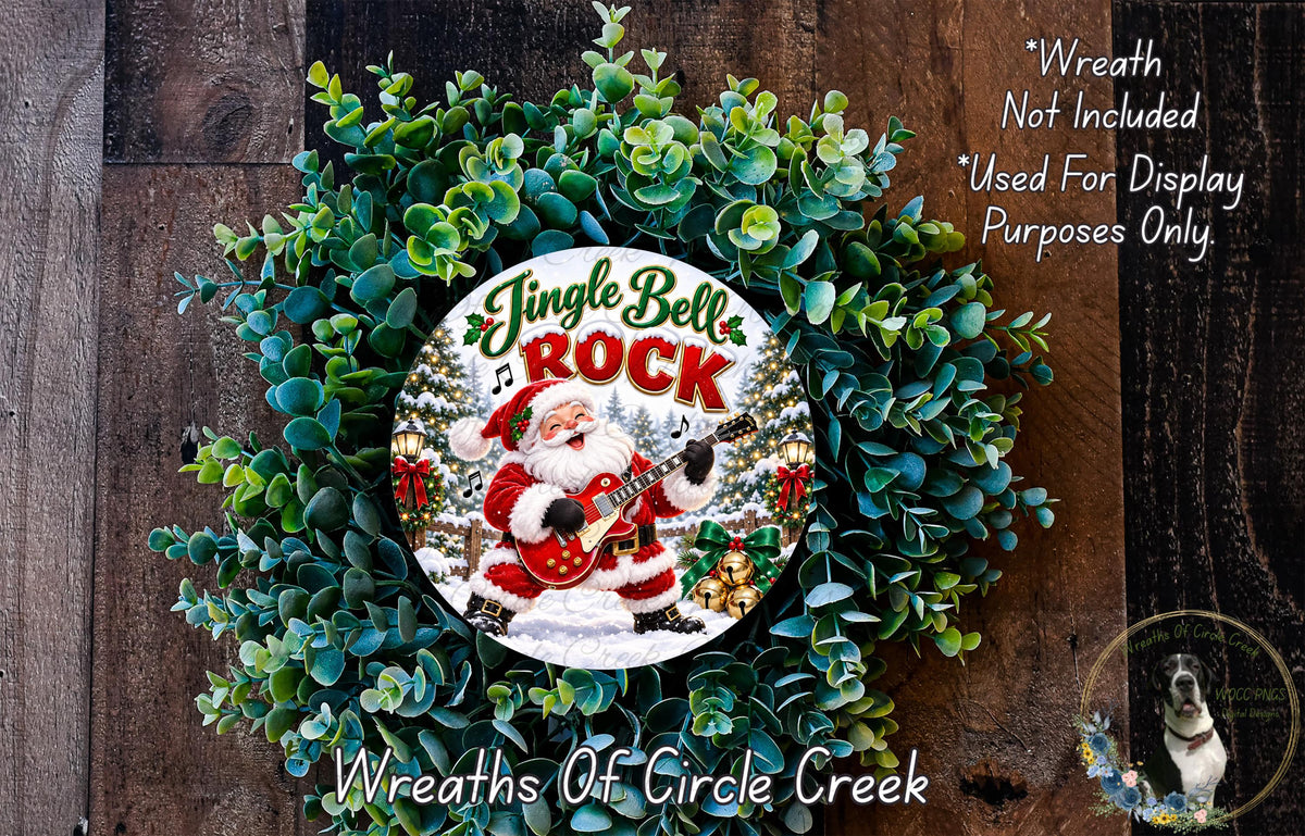 A wreath made of green leaves and featuring a Santa Claus figure playing a guitar, with the text "Jingle Bell Rock" and "Wreaths of Circle Creek" displayed on it.