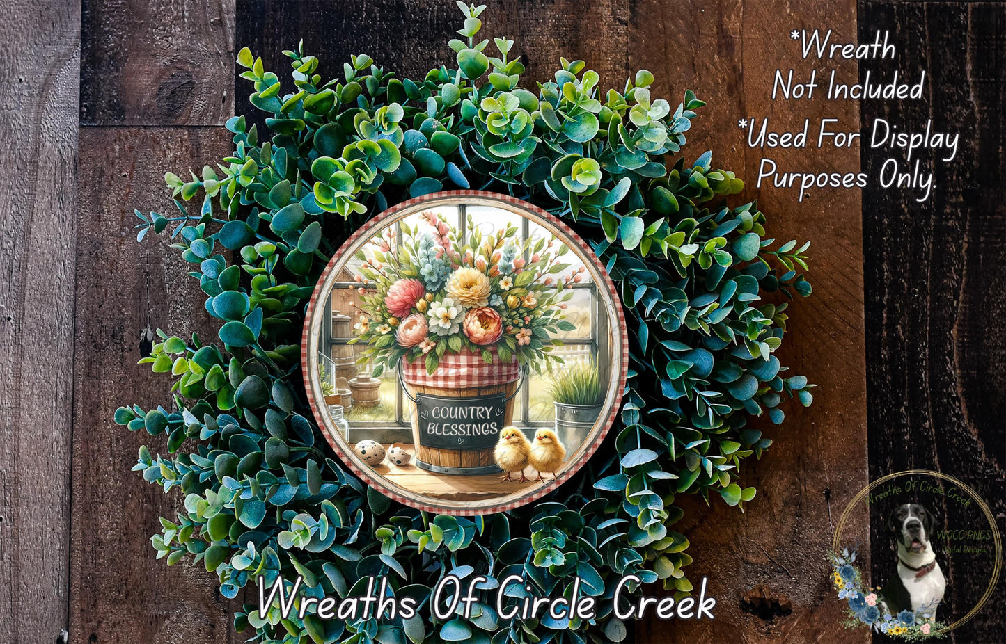 a wreath with a vase of flowers and a sign that reads "Country Blessings" on it, set against a wooden background.