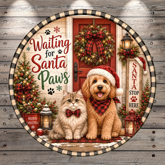 A dog and a cat wearing Santa hats and plaid bandanas are sitting on a porch decorated for Christmas, with a wreath, lanterns, and other holiday decorations.