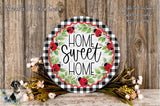 a decorative sign with the text "HOME SWEET HOME" surrounded by a floral border and a black and white checkered pattern. The sign is placed on a wooden surface, with a bouquet of flowers and greenery nearby.