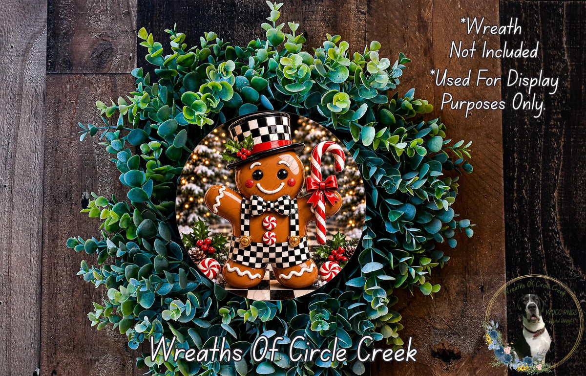 A wreath featuring a gingerbread man figure surrounded by greenery, with a caption indicating that the wreath is not included in a display and is used for purposes only.