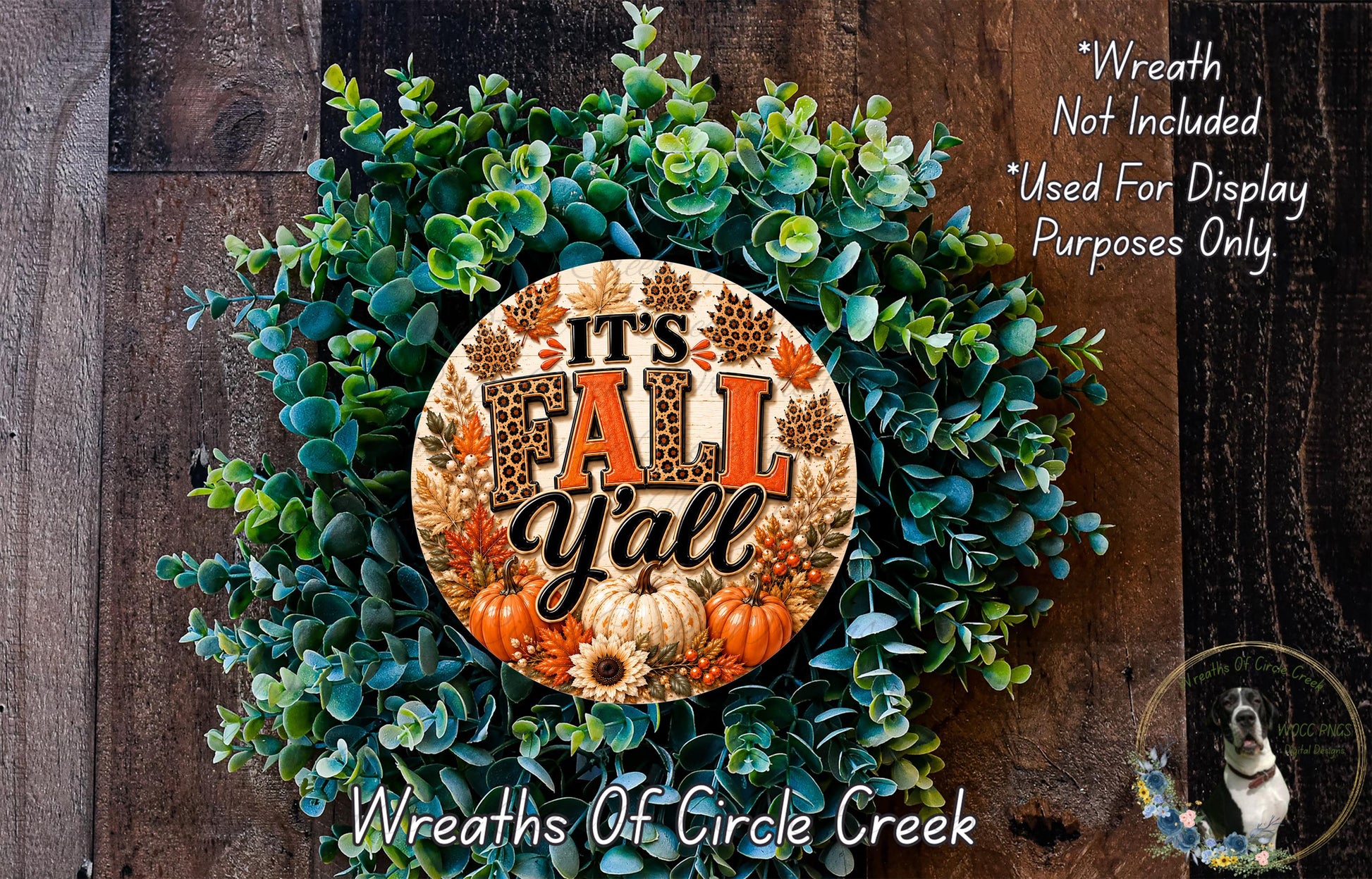 a wreath made of various fall-themed elements, including pine cones, pumpkins, and leaves, with the text "It's Fall Y'all" prominently displayed on the wreath.