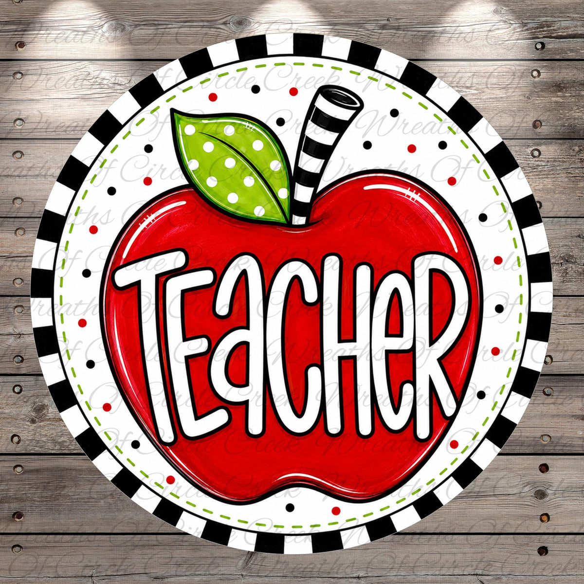 A red apple with the word "Teacher" written on it, surrounded by a black and white striped border.