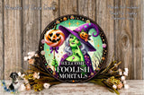 a picture of a welcome sign with a witch and pumpkin