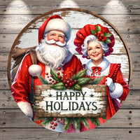 Santa Claus and Granny Claus, dressed in their traditional red outfits, are holding a sign that says "Happy Holidays".