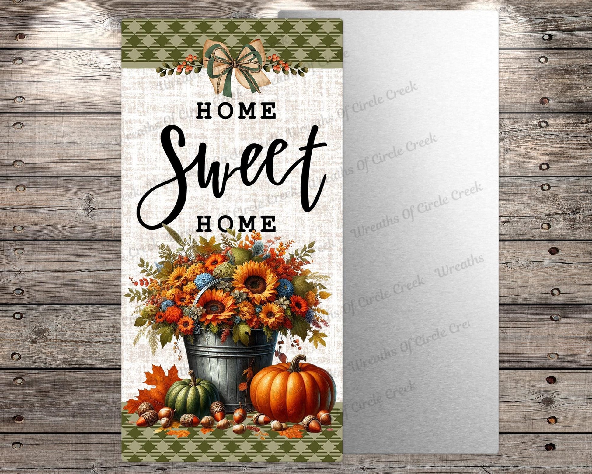 a sign that says home sweet home with pumpkins and sunflowers