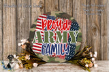 a patriotic-themed wreath with the text "Proud Army Family" displayed prominently. The wreath is surrounded by flowers and placed on a wooden surface.