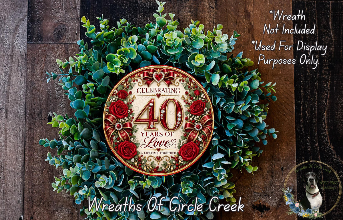 a wreath celebrating 40 years of love, with a red and gold design and a white and gold center. The wreath is surrounded by green foliage and red roses, creating a festive and romantic atmosphere.