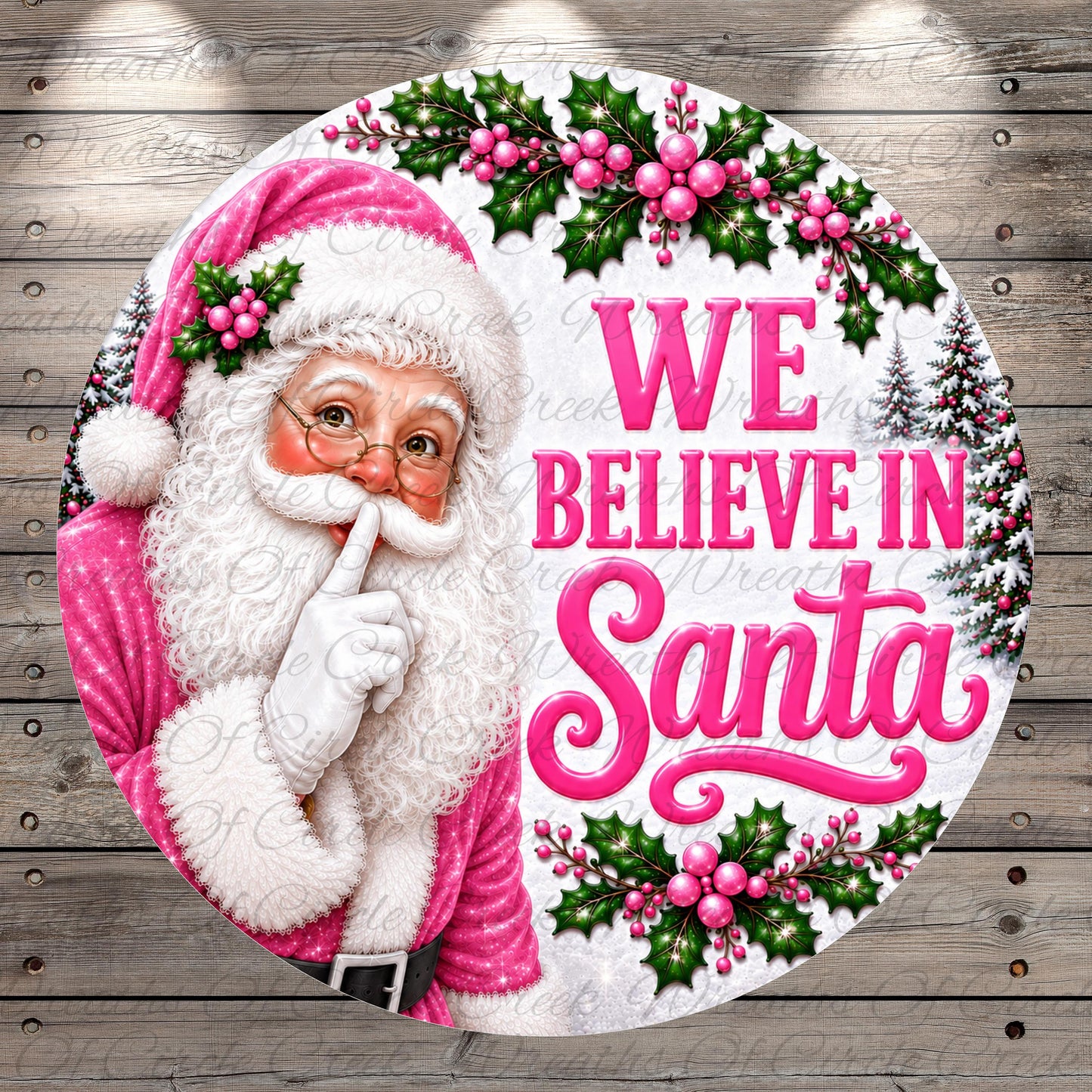 Santa Claus with a pink and white outfit, surrounded by holly leaves, berries, and the text "We believe in Santa"