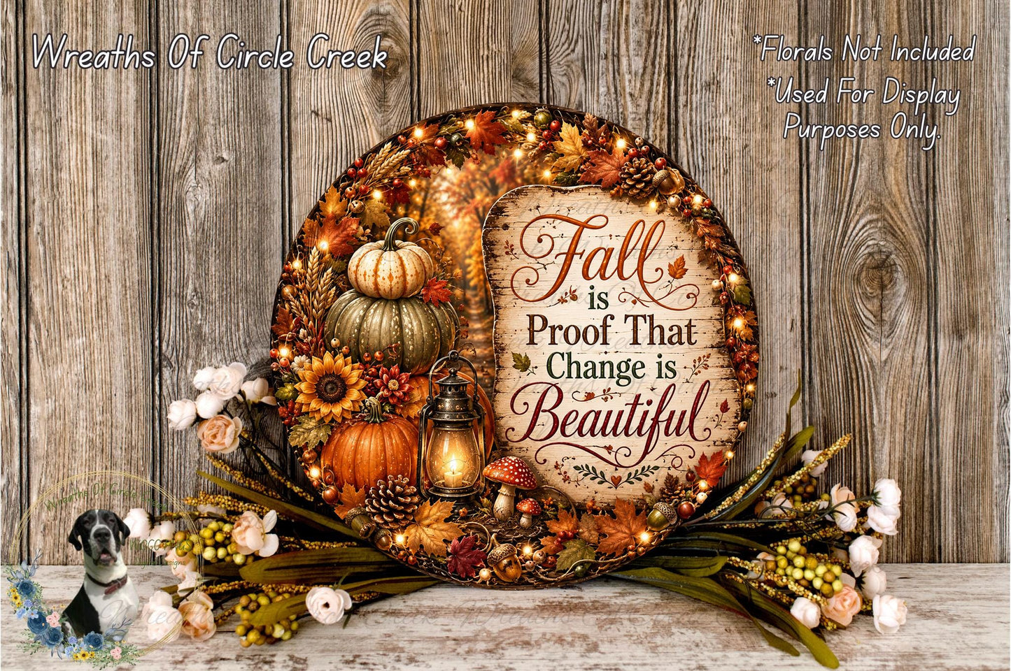 a decorative wreath with fall-themed elements, including pumpkins, sunflowers, pine cones, and a lantern, set against a rustic wooden background.
