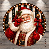 A digital illustration of Santa Claus wearing a red suit and hat, holding a red bow and cane, with a festive background featuring snowflakes and lights.