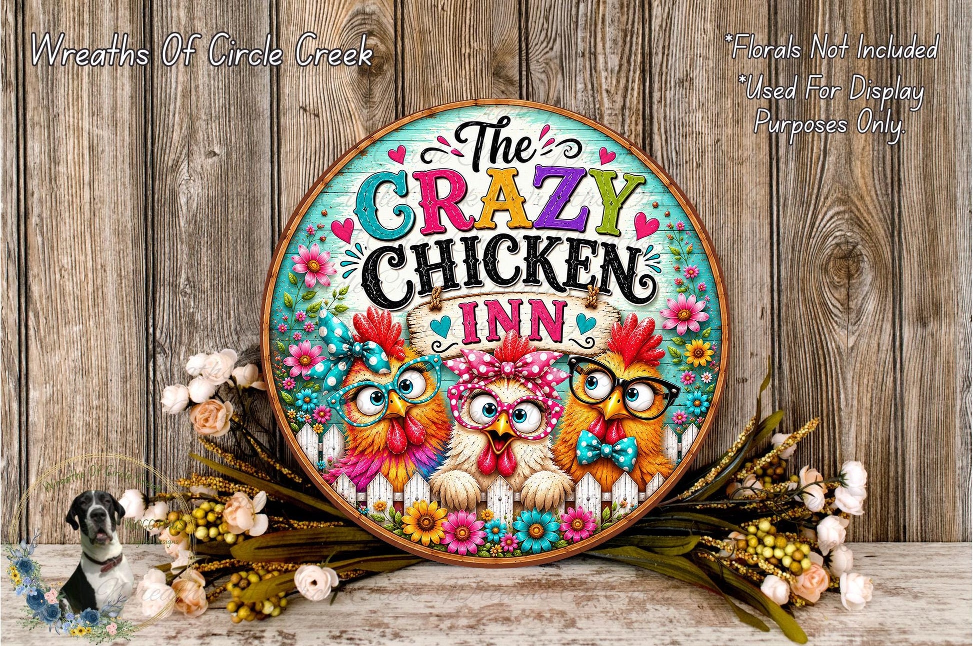 a colorful sign for "The Crazy Chicken Inn" with a whimsical design of cartoon chickens and flowers.