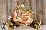 A floral arrangement with a teacup and saucer, a butterfly, and a vase of flowers, set against a wooden background.