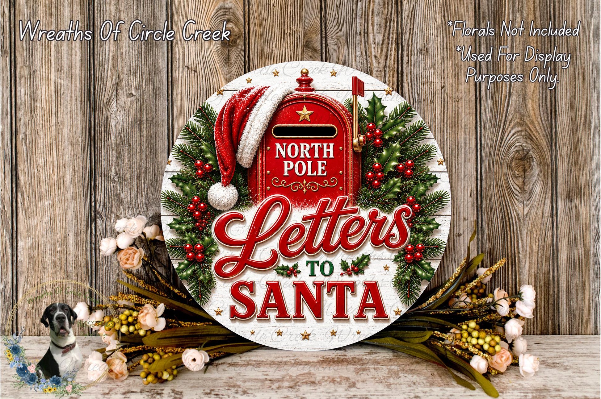 A festive wreath with a red mailbox and the text "Letters to Santa" displayed on it, surrounded by holiday decorations such as pine branches, berries, and flowers.