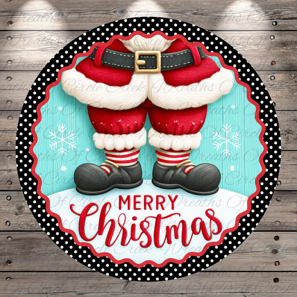 A festive Christmas-themed image featuring a pair of Santa Claus feet wearing red and white striped socks, black shoes, and a red belt, with the text "Merry Christmas" displayed on a circular frame.