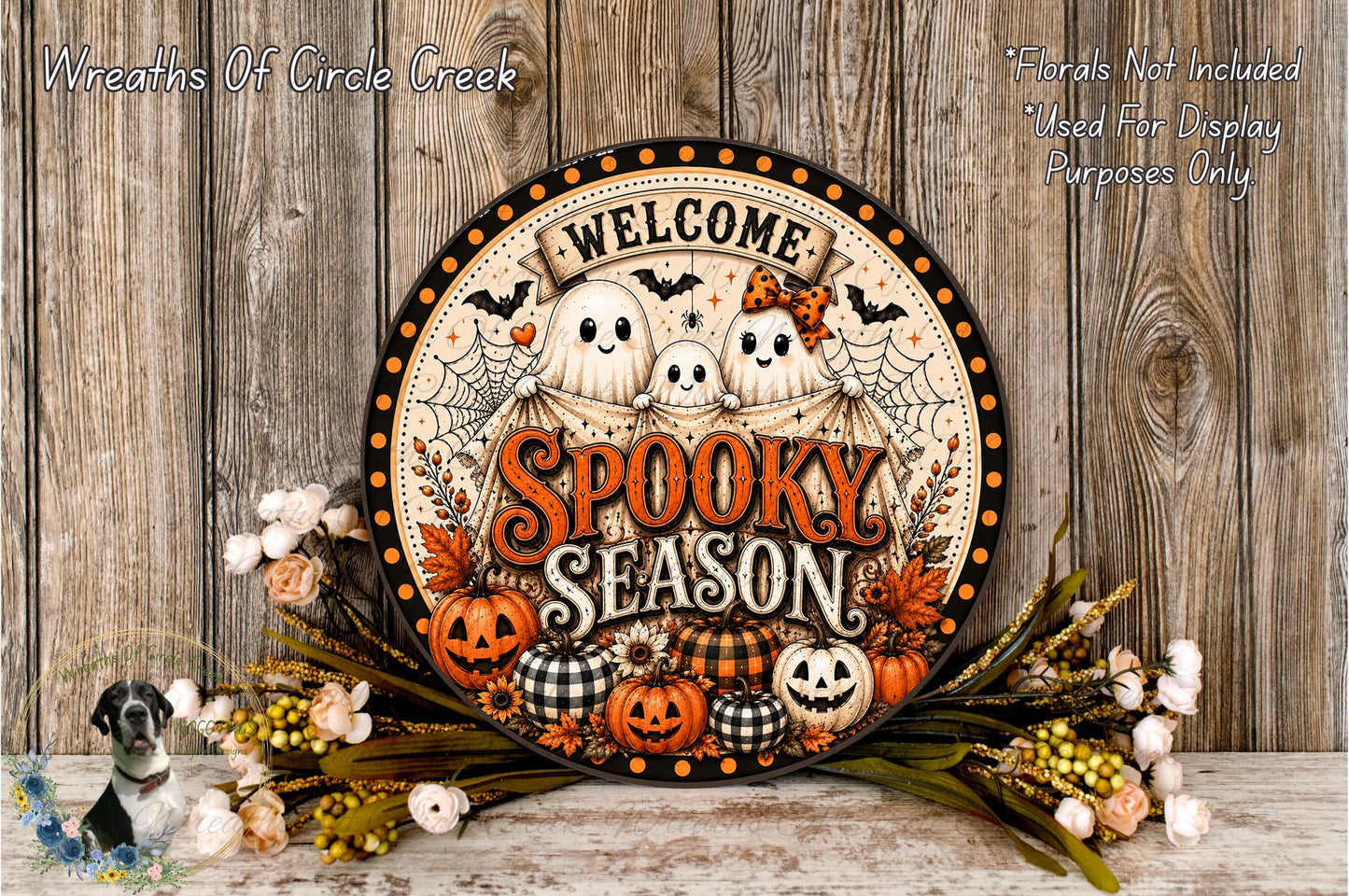 A Halloween-themed sign with the text "Welcome Spooky Season" surrounded by various Halloween-themed decorations such as pumpkins, bats, and ghostly figures.