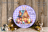 A decorative Easter-themed sign featuring a bunny house surrounded by colorful Easter eggs and flowers, with the text "Every Bunny Welcome" displayed on the sign.