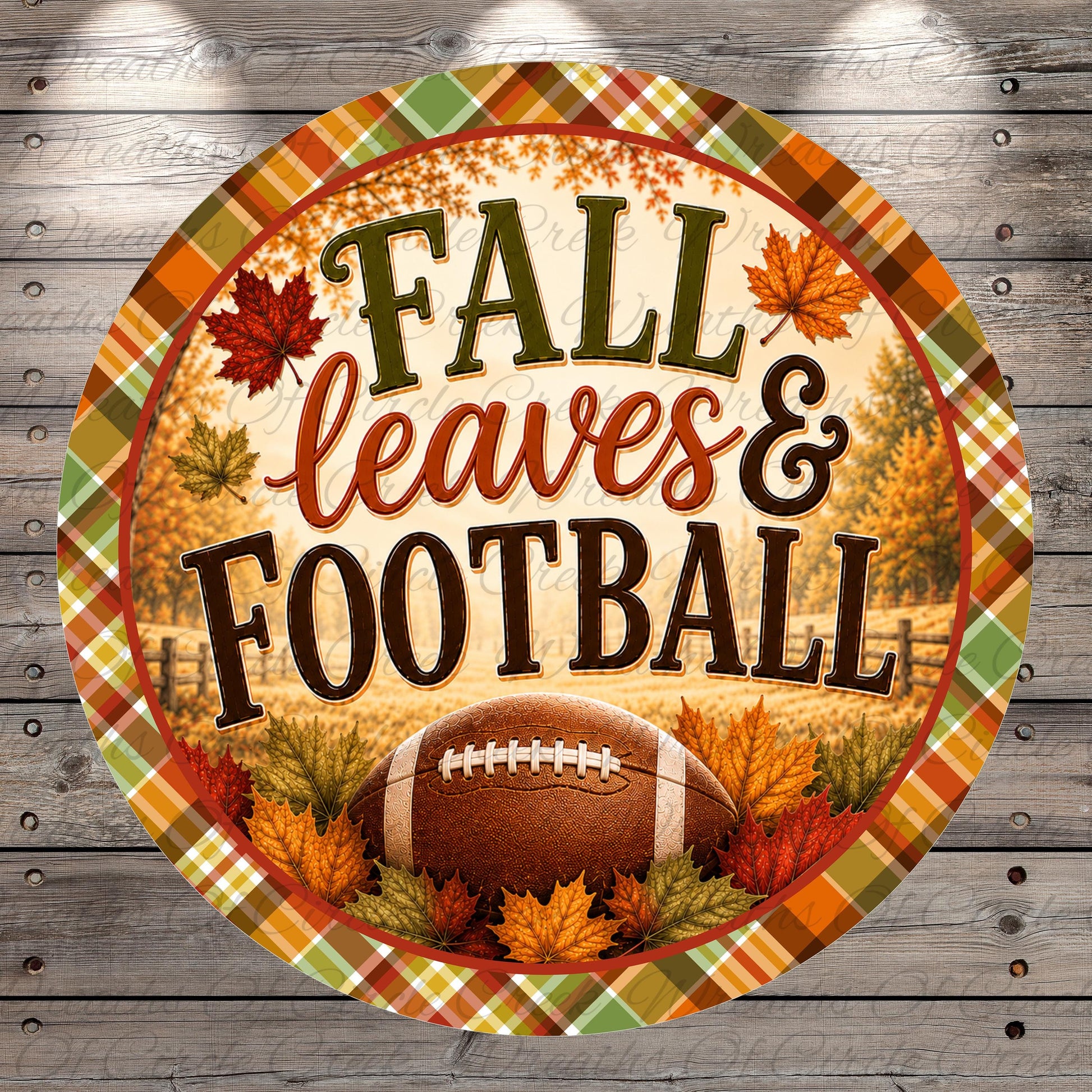 A circular sign with the text "FALL leaves & FOOTBALL" surrounded by autumn leaves and a football.