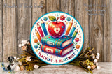 a picture of an apple on a stack of books