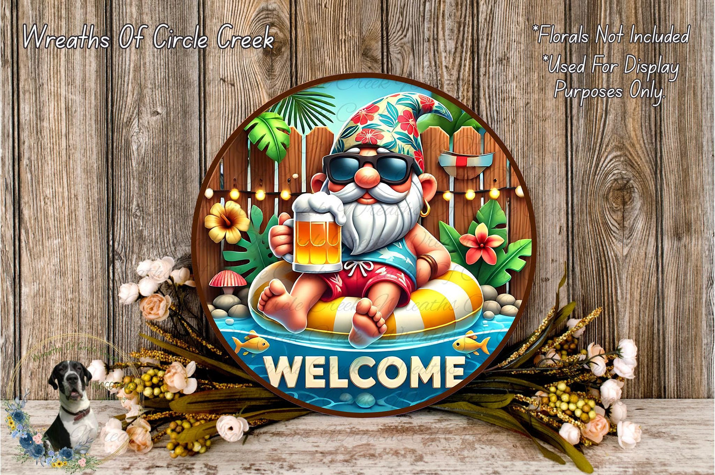 A round sign featuring a cartoon gnome sitting on a floating pool, holding a beer and surrounded by flowers and greenery.
