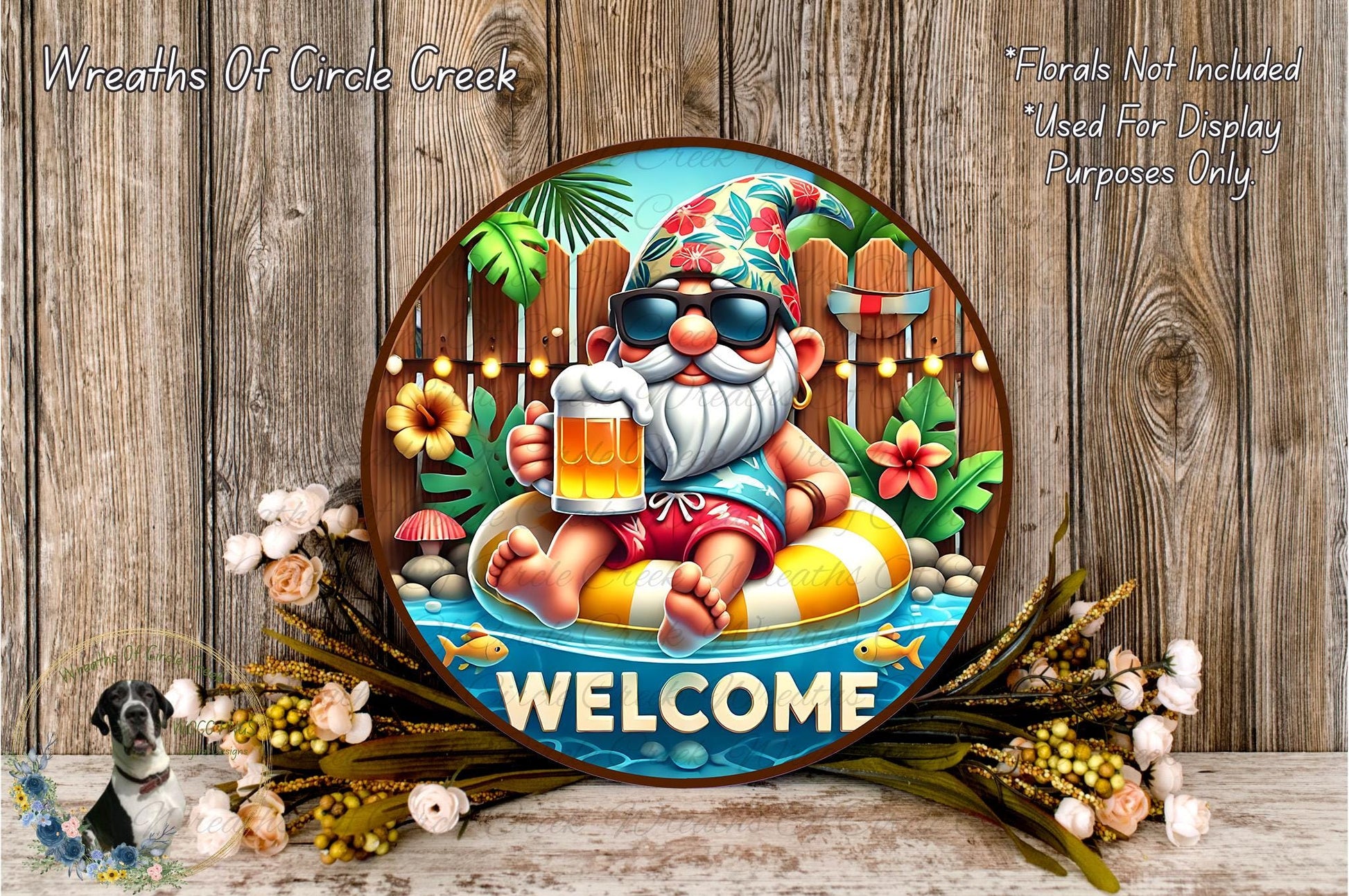 A round sign featuring a cartoon gnome sitting on a floating pool, holding a beer and surrounded by flowers and greenery.