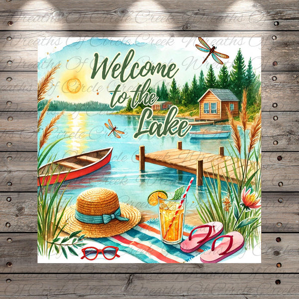 The image is a vibrant and colorful illustration of a lakeside scene, featuring a wooden dock, a cabin, boats, and various summer accessories such as a straw hat, sunglasses, and a drink.