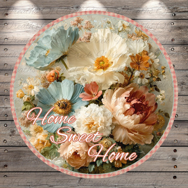 A circular arrangement of various colorful flowers, including white, blue, and orange blooms, with the text "Home Sweet Home" written in cursive on the border.