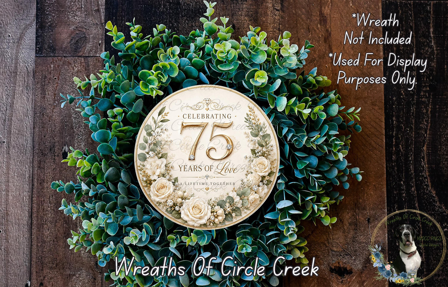 a wreath celebrating 75 years of love, adorned with greenery and flowers. The wreath is displayed on a wooden surface, and there is a small dog in the bottom right corner of the image.