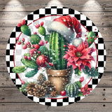 A festive arrangement of cacti, poinsettias, pine cones, and ornaments, all set against a checkered background.