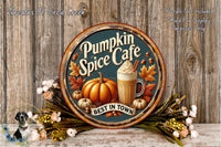 A decorative sign for "Pumpkin Spice Cafe" with a pumpkin, a mug of pumpkin spice drink, and autumn leaves. The sign is surrounded by flowers and placed on a wooden surface.