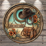 A rustic wooden barrel with a cowboy hat, a horseshoe, and a bag, surrounded by flowers and a sign that says "Home Sweet Home".