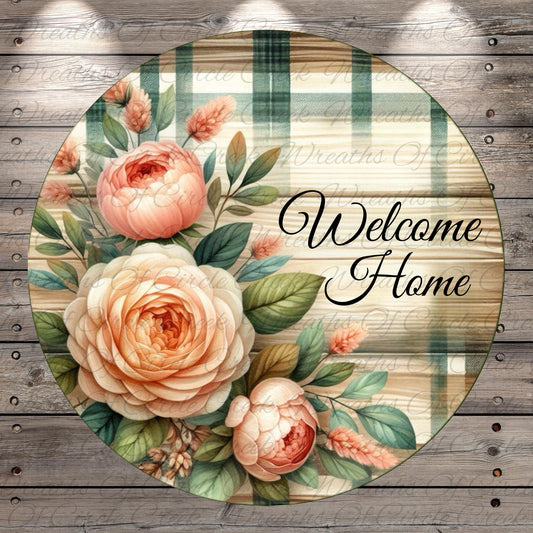 a welcome sign with flowers on a wooden background