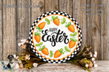 A decorative Easter wreath with a black and white checkered border, surrounded by orange carrots and green leaves. The wreath has the text "Happy Easter" written on it. The wreath is placed on a wooden surface, and there are some flowers and greenery around it.