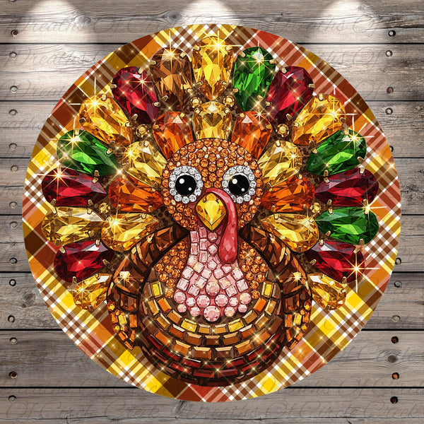 A colorful and intricate turban-like design made of various materials, including jewels, beads, and feathers, is displayed on a wooden surface.