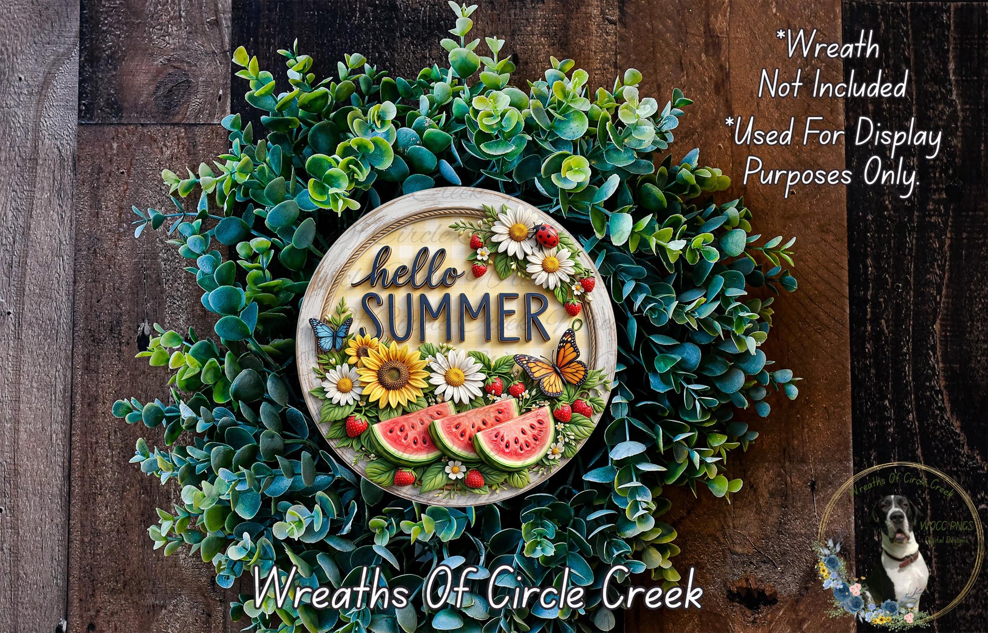 A wreath made of various green plants and flowers, with a sign that says "Hello Summer" in the center.