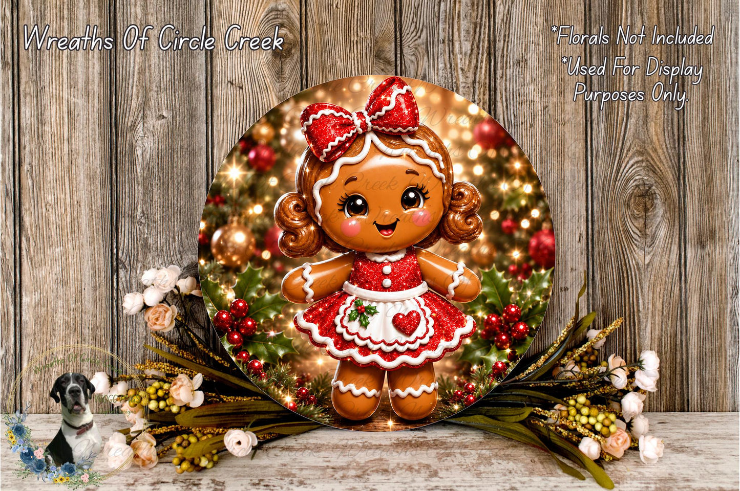 A round, decorative plate featuring a gingerbread girl with a bow, surrounded by a wreath of flowers and greenery, against a wooden background.