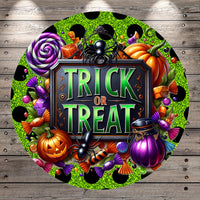 The image is a vibrant and colorful illustration featuring a Halloween-themed design. It includes various spooky and festive elements such as a pumpkin, spider, lollipop, candy, and a sign that says "TRICK OR TREAT". The overall composition is visually engaging and captures the essence of the Halloween season.